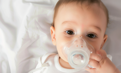 Child with breathing mask.