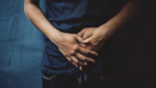 Man holding gut