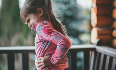 Child with back pain from scoliosis