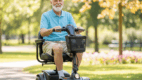 Senior man using a 4-wheel travel scooter outdoors