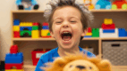 Child roaring like a lion during speech play – great for practicing the /r/ sound.