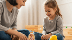 Doll play is a fun way to model pronouns in everyday routines.