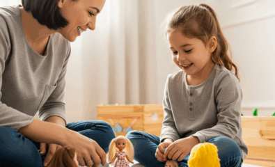 Doll play is a fun way to model pronouns in everyday routines.